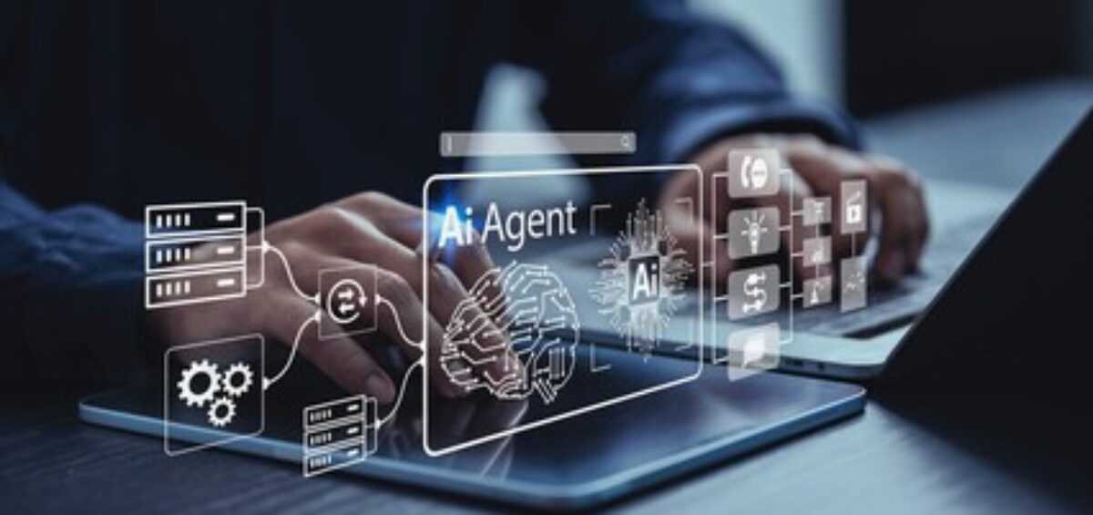 Business professional using a laptop with an AI agent interface.